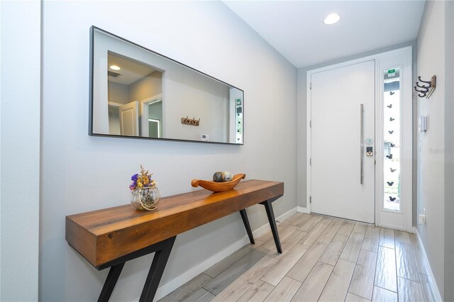 4414 Le Reve Ct, Kissimmee, FL 34746 - entryway featuring baseboards, light wood-style flooring, and recessed lighting