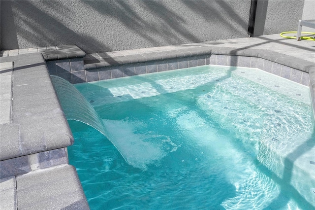 4414 Le Reve Ct, Kissimmee, FL 34746 - view of swimming pool with a swimming pool and an in-ground hot tub