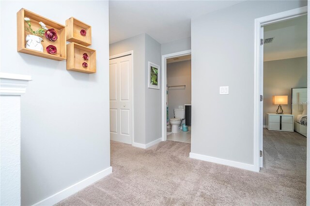 4414 Le Reve Ct, Kissimmee, FL 34746 - hallway featuring carpet floors and baseboards