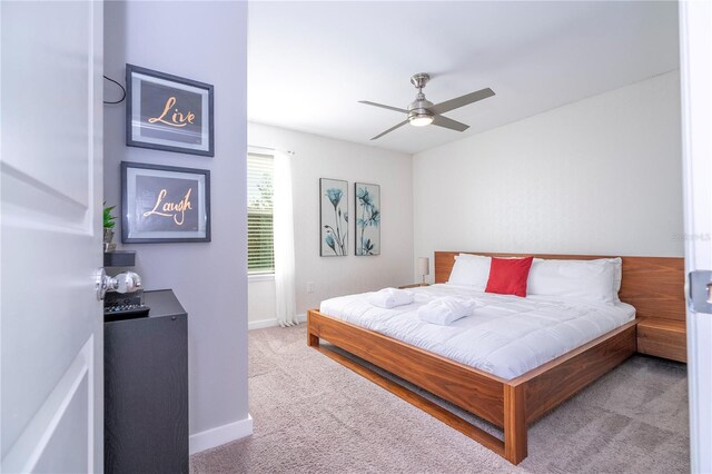 4414 Le Reve Ct, Kissimmee, FL 34746 - bedroom with carpet floors, baseboards, and a ceiling fan