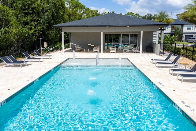 4414 Le Reve Ct, Kissimmee, FL 34746 - community pool featuring a patio