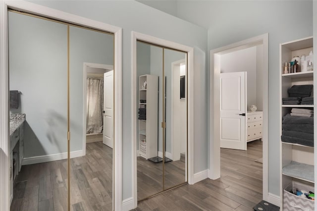 2122 Palm Crest Dr, Apopka, FL 32712 - hallway with dark wood-type flooring and baseboards