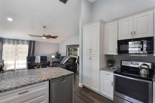 2122 Palm Crest Dr, Apopka, FL 32712 - kitchen with stainless steel appliances, tasteful backsplash, a ceiling fan, dark wood finished floors, and white cabinets