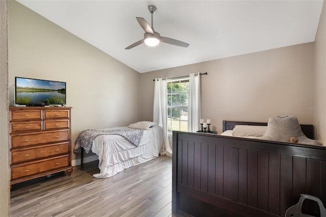 2122 Palm Crest Dr, Apopka, FL 32712 - bedroom with lofted ceiling, wood finished floors, and ceiling fan
