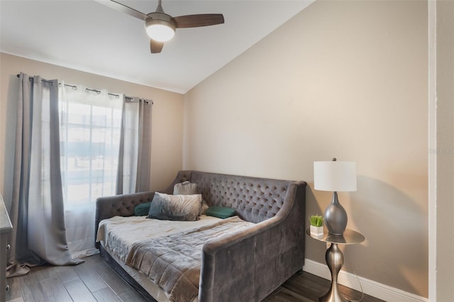 2122 Palm Crest Dr, Apopka, FL 32712 - bedroom featuring wood finished floors, lofted ceiling, baseboards, and a ceiling fan