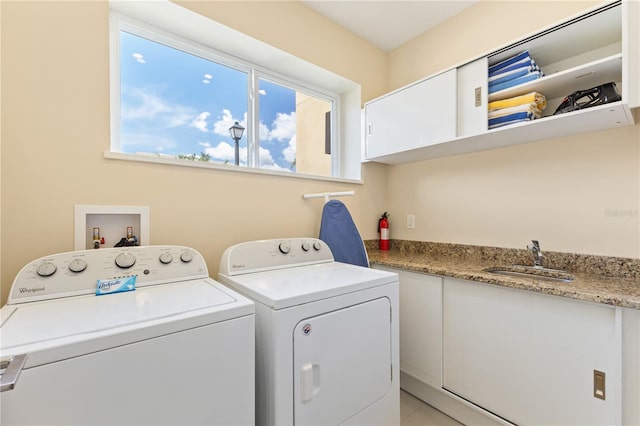 3149 Brasilia Ave, Kissimmee, FL 34747 - washroom featuring washer and clothes dryer and cabinet space