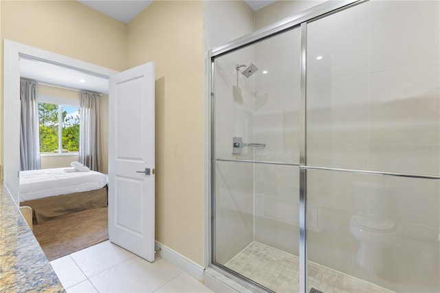 3149 Brasilia Ave, Kissimmee, FL 34747 - bathroom with ensuite bath, a shower stall, and tile patterned floors