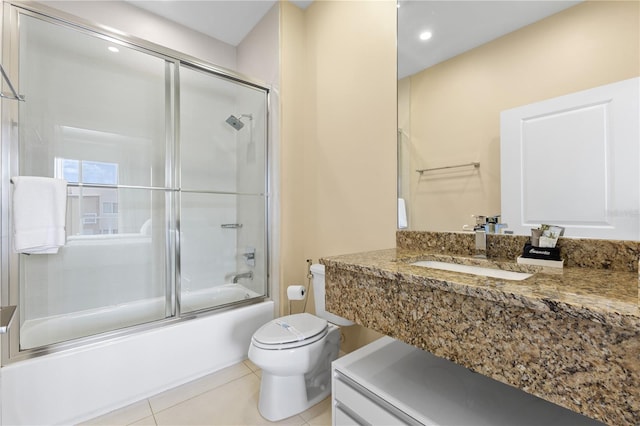 3149 Brasilia Ave, Kissimmee, FL 34747 - full bathroom with shower / bath combination with glass door, vanity, tile patterned flooring, and recessed lighting