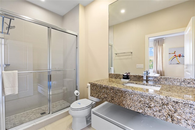 3149 Brasilia Ave, Kissimmee, FL 34747 - bathroom featuring a stall shower, vanity, recessed lighting, and tile patterned flooring