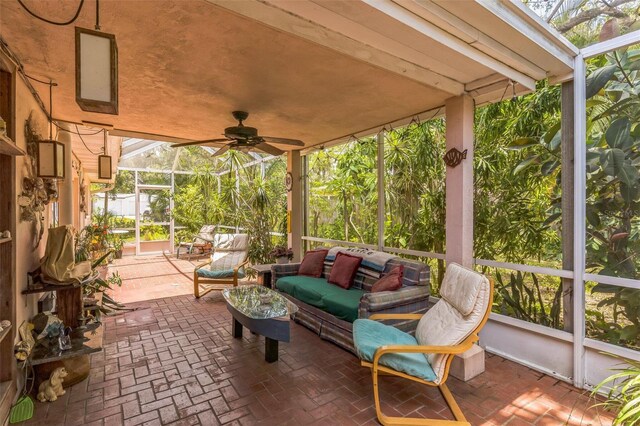 251 Tropic Blvd W, Largo, FL 33770 - view of patio / terrace featuring glass enclosure, ceiling fan, and an outdoor living space