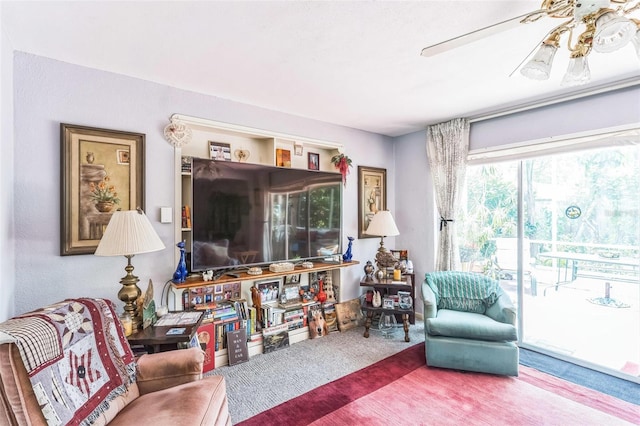 251 Tropic Blvd W, Largo, FL 33770 - carpeted living area featuring a ceiling fan