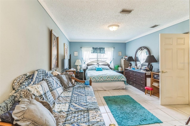 251 Tropic Blvd W, Largo, FL 33770 - bedroom featuring tile patterned flooring and a textured ceiling