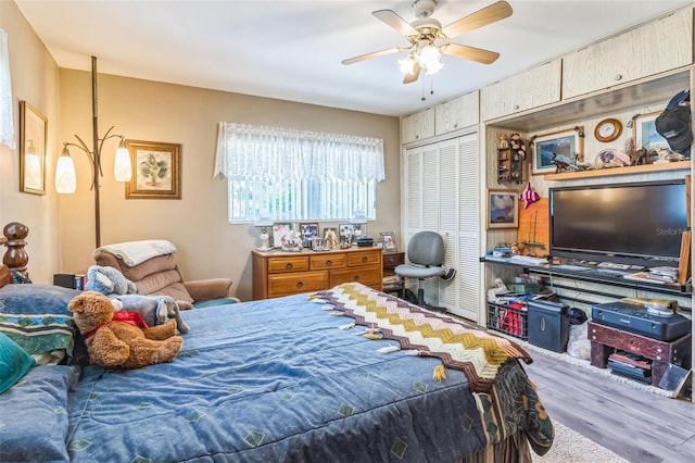 251 Tropic Blvd W, Largo, FL 33770 - bedroom with wood finished floors, a closet, and a ceiling fan