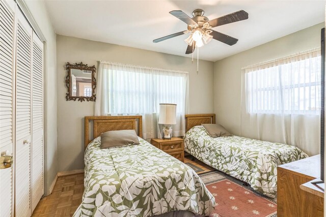 251 Tropic Blvd W, Largo, FL 33770 - bedroom featuring a closet, multiple windows, and ceiling fan