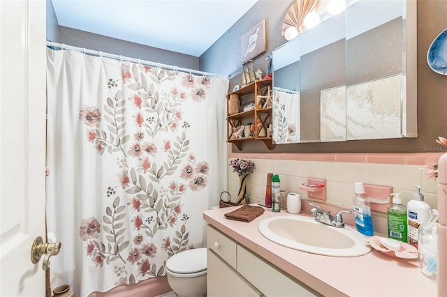 251 Tropic Blvd W, Largo, FL 33770 - full bathroom with vanity, toilet, a shower with shower curtain, and decorative backsplash
