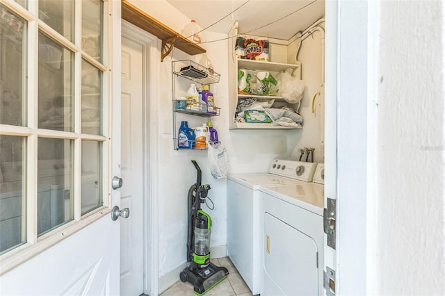 251 Tropic Blvd W, Largo, FL 33770 - laundry room with independent washer and dryer and light tile patterned floors