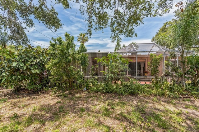 251 Tropic Blvd W, Largo, FL 33770 - view of yard with glass enclosure