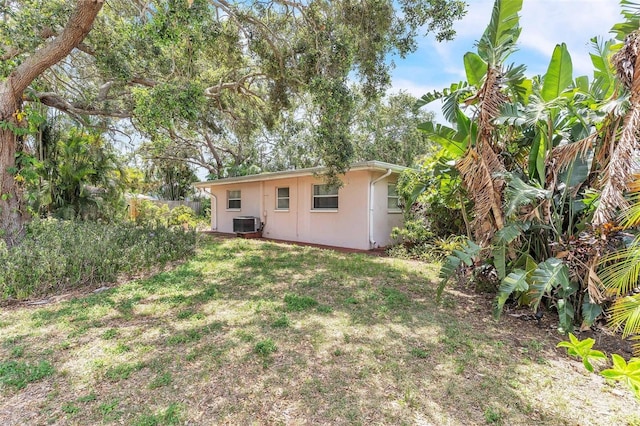 251 Tropic Blvd W, Largo, FL 33770 - view of yard with central AC unit