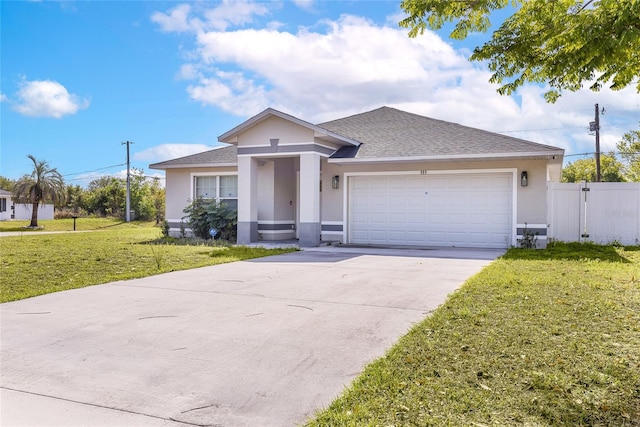 999 Trumbull St, Deltona, FL 32725 - ranch-style house featuring stucco siding, a garage, driveway, and a shingled roof