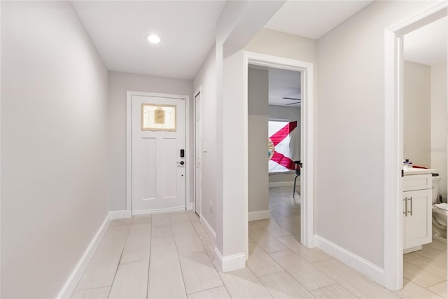 999 Trumbull St, Deltona, FL 32725 - corridor featuring baseboards and recessed lighting