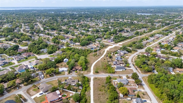 999 Trumbull St, Deltona, FL 32725 - aerial view of property and surrounding area with nearby suburban area
