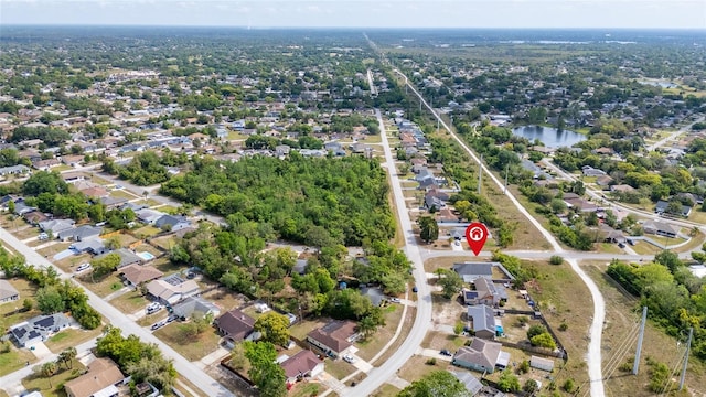 999 Trumbull St, Deltona, FL 32725 - aerial view of property and surrounding area featuring nearby suburban area