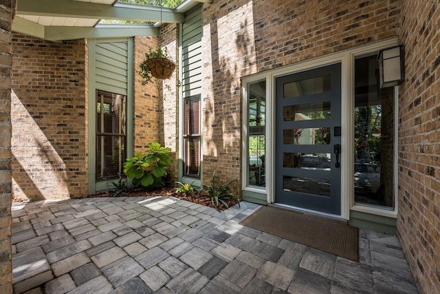 20 Twelve Oaks Trl, Ormond Beach, FL 32174 - entrance to property with a patio and brick siding
