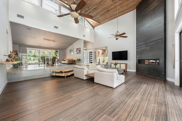 20 Twelve Oaks Trl, Ormond Beach, FL 32174 - living room featuring a ceiling fan, high vaulted ceiling, wood finished floors, baseboards, and a large fireplace