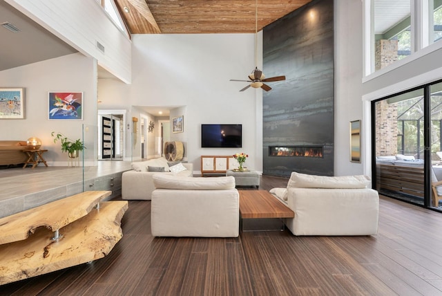 20 Twelve Oaks Trl, Ormond Beach, FL 32174 - living room with high vaulted ceiling, a large fireplace, wooden ceiling, ceiling fan, and dark wood finished floors