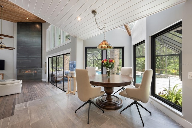 20 Twelve Oaks Trl, Ormond Beach, FL 32174 - dining room featuring wood finished floors, wood ceiling, and high vaulted ceiling