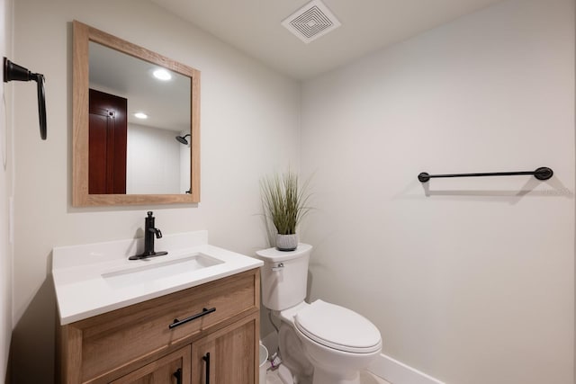 20 Twelve Oaks Trl, Ormond Beach, FL 32174 - half bathroom featuring vanity, toilet, recessed lighting, and baseboards