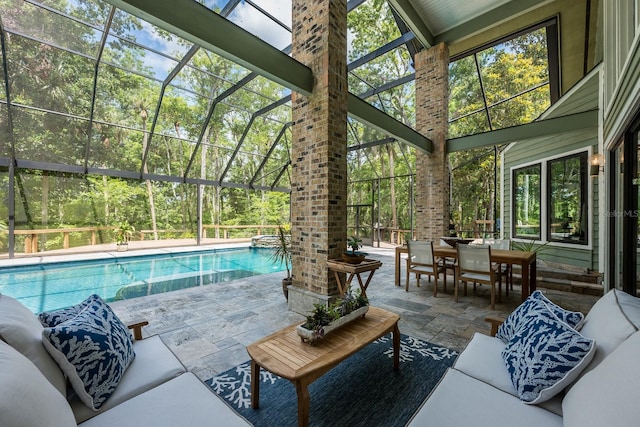20 Twelve Oaks Trl, Ormond Beach, FL 32174 - view of patio / terrace with an outdoor living space, a lanai, outdoor dining area, and a pool with connected hot tub