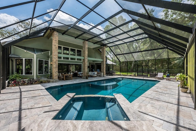 20 Twelve Oaks Trl, Ormond Beach, FL 32174 - view of pool featuring a pool with connected hot tub, a patio area, and an outdoor hangout area