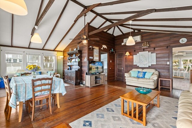 4039 S Atlantic Ave, Port Orange, FL 32127 - living room featuring wooden walls, wood finished floors, ceiling fan, and an AC wall unit