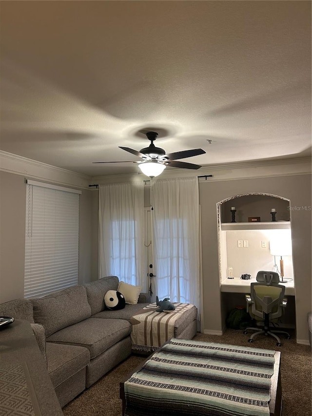 3417 Westchester Square Blvd Unit 202, Orlando, FL 32835 - carpeted living area with ceiling fan and ornamental molding