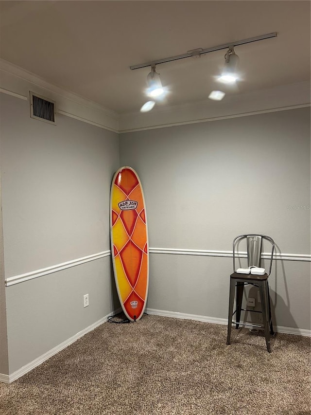 3417 Westchester Square Blvd Unit 202, Orlando, FL 32835 - playroom featuring track lighting, carpet flooring, baseboards, and ornamental molding