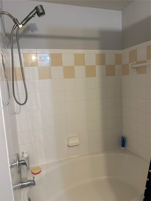 3417 Westchester Square Blvd Unit 202, Orlando, FL 32835 - bathroom featuring bathing tub / shower combination
