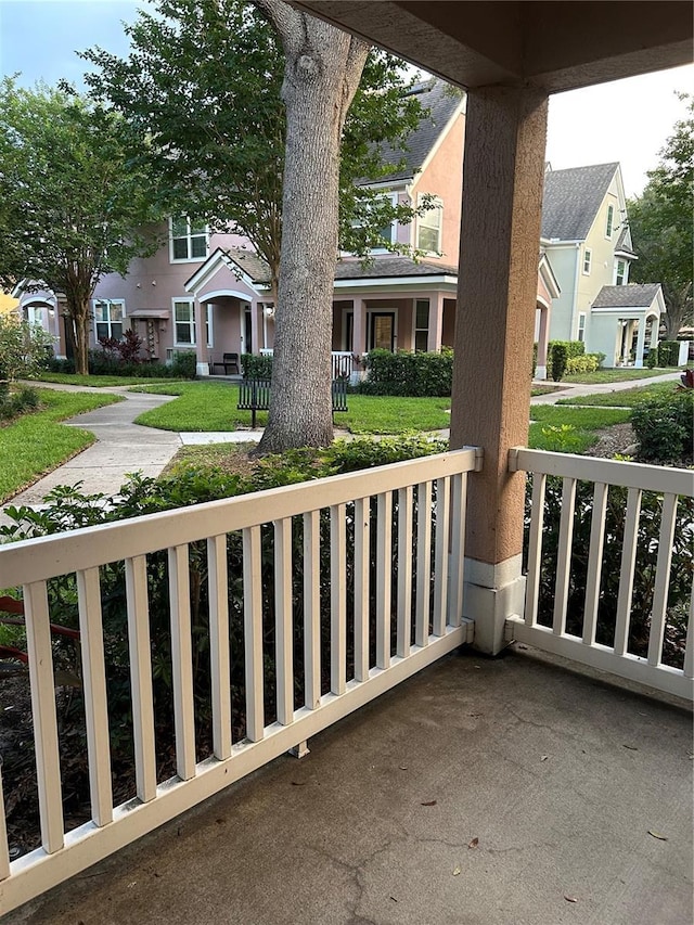 3417 Westchester Square Blvd Unit 202, Orlando, FL 32835 - porch featuring a residential view