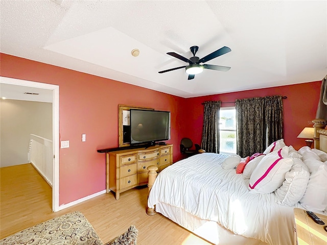 1803 Meadow Pond Way, Orlando, FL 32824 - bedroom with light wood-style floors, ceiling fan, and baseboards