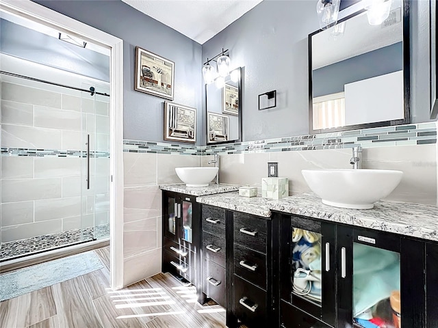 1803 Meadow Pond Way, Orlando, FL 32824 - full bath with tile walls, vanity, and a shower stall