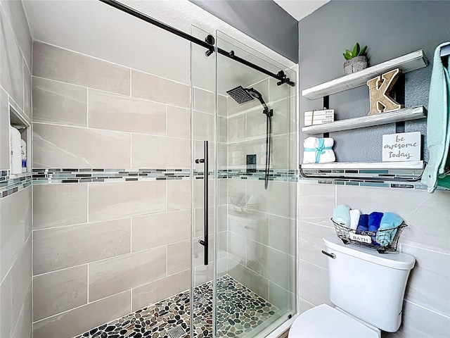 1803 Meadow Pond Way, Orlando, FL 32824 - full bathroom with toilet, a stall shower, and tile walls
