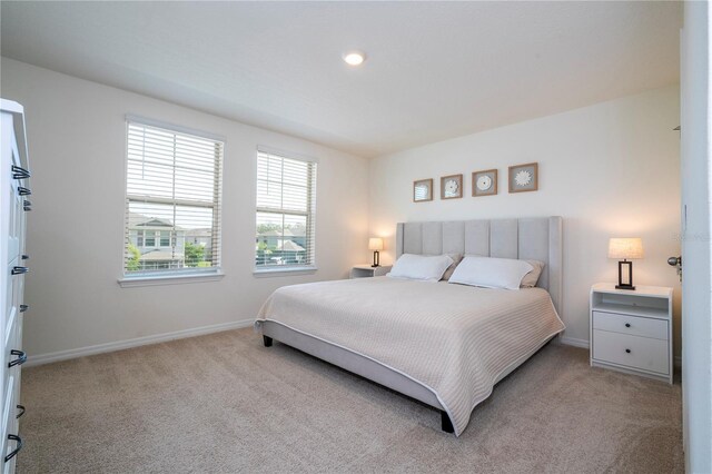 13452 Sagestone Dr, Winter Garden, FL 34787 - carpeted bedroom with baseboards