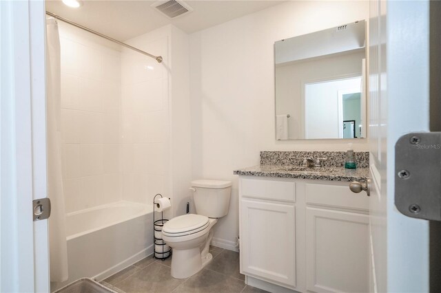 13452 Sagestone Dr, Winter Garden, FL 34787 - full bath featuring toilet, vanity, tile patterned floors, shower / bath combo, and baseboards
