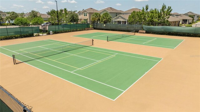 13452 Sagestone Dr, Winter Garden, FL 34787 - view of tennis court with community basketball court and a residential view