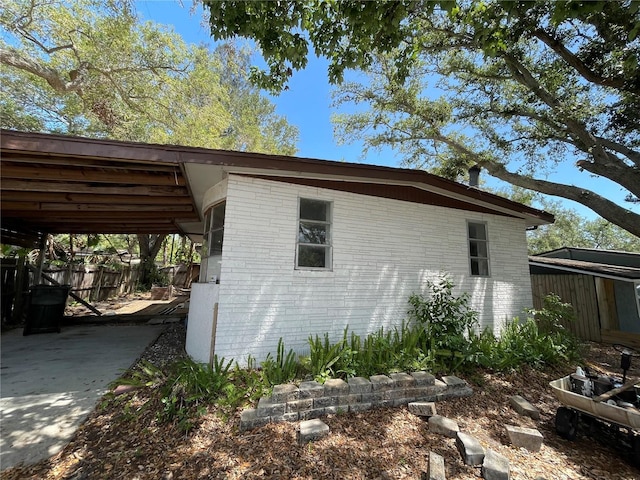 432 2nd Ave NE, Largo, FL 33770 - view of home's exterior featuring brick siding