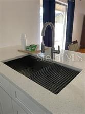 1422 Spalding Rd, Winter Springs, FL 32708 - kitchen view of a sink and light countertops