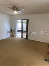 1422 Spalding Rd, Winter Springs, FL 32708 - empty room with ceiling fan and carpet flooring