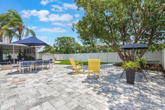 719 Stevelynn Cir, Winter Garden, FL 34787 - fenced backyard featuring a patio and outdoor dining space