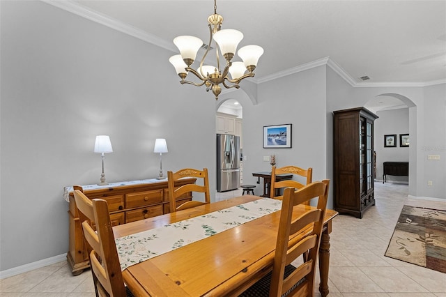 1124 Hidden Blf, Clermont, FL 34711 - dining area featuring arched walkways, a chandelier, crown molding, baseboards, and light tile patterned floors