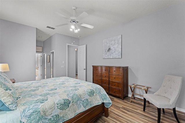 1124 Hidden Blf, Clermont, FL 34711 - bedroom with wood finished floors, baseboards, and a ceiling fan